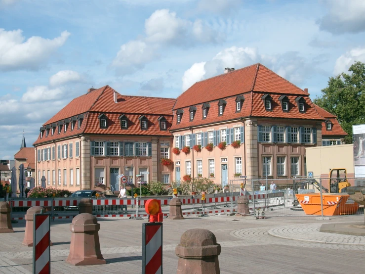 two large buildings are pictured in the distance