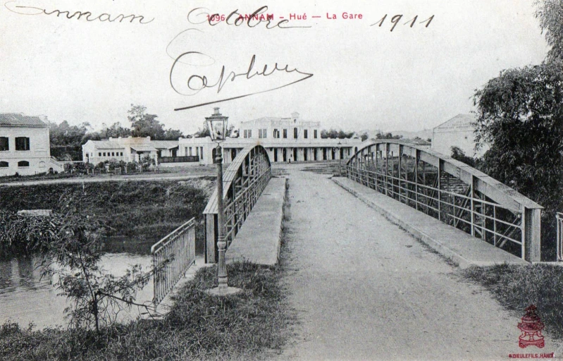 a bridge across a river in a village