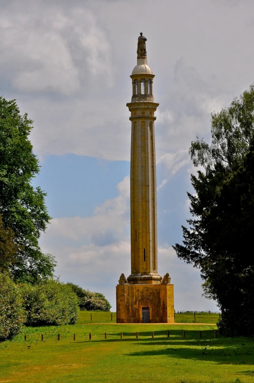 the tower is built into the grass, overlooking trees