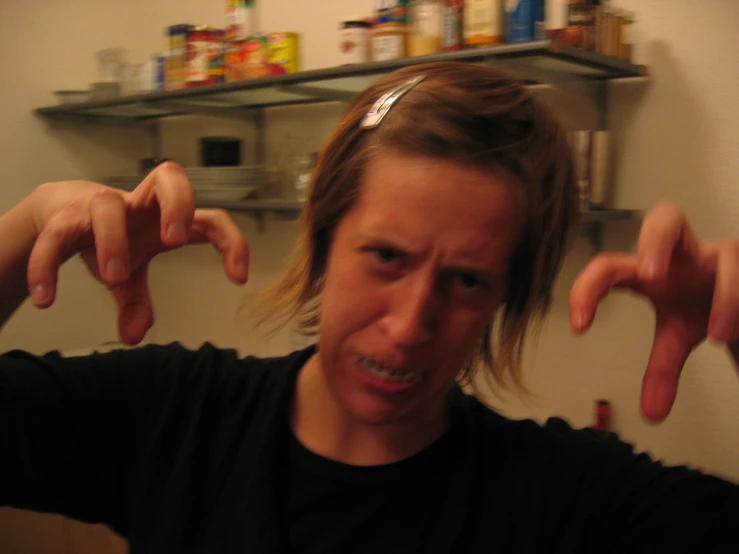 a man making the weird face in a kitchen