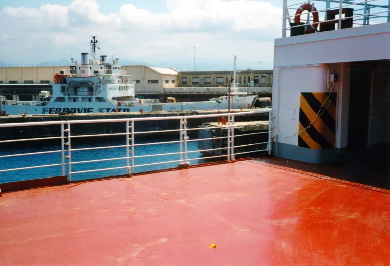 a view from a ship looking at another boat