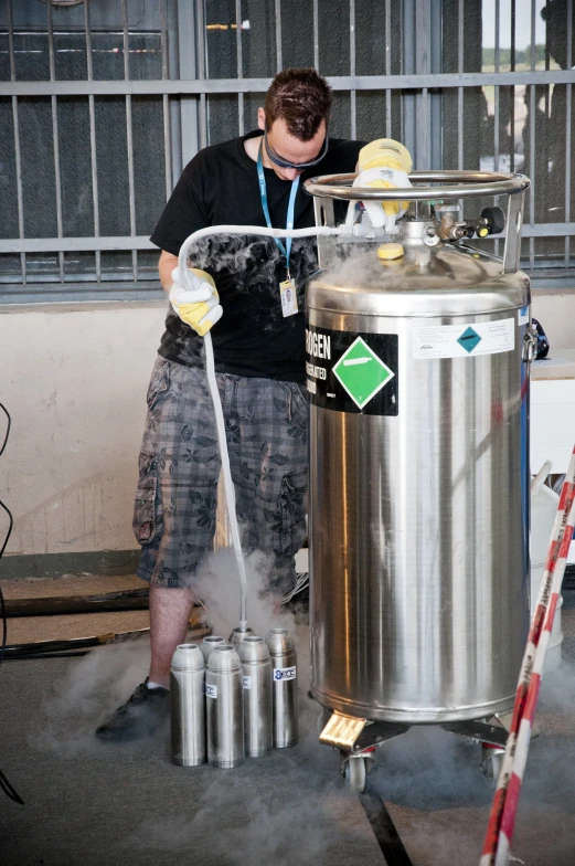 a man using steam cleaner on the outside