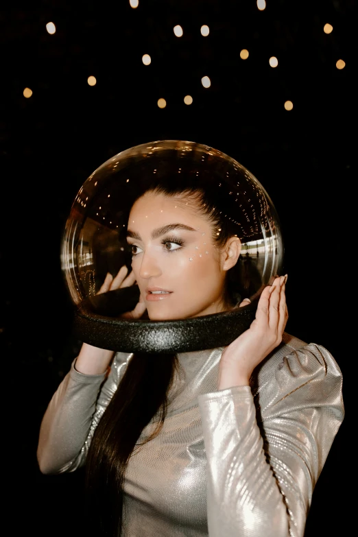 a woman wearing a helmet on top of her head, an album cover, inspired by Ion Andreescu, trending on pexels, holography, sasha grey, wears tiny spacesuit, (night), look like model