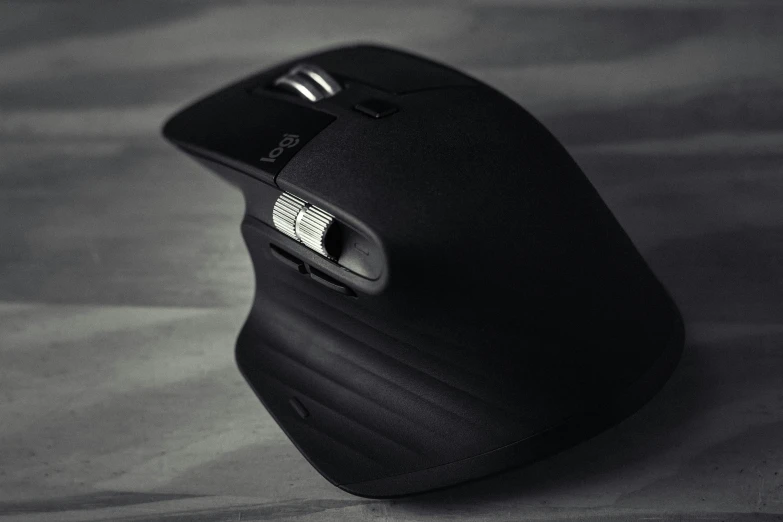 a close up of a computer mouse on a table