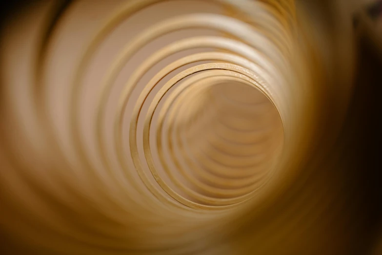 a close up view of the inside of a tube, unsplash, generative art, pine wood, ivory, medium format. soft light, spirals