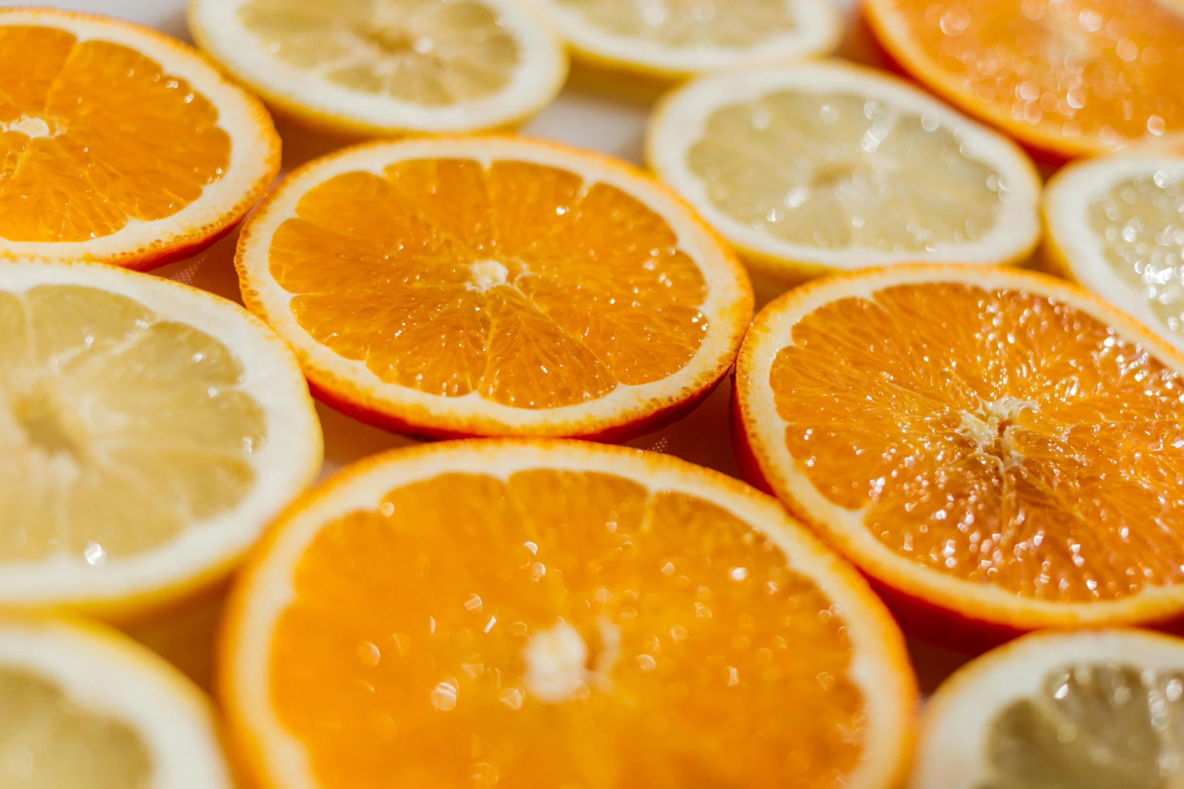 a pile of sliced oranges sitting on top of each other, by Carey Morris, pexels, 🦩🪐🐞👩🏻🦳, multi chromatic, lemonade, background image