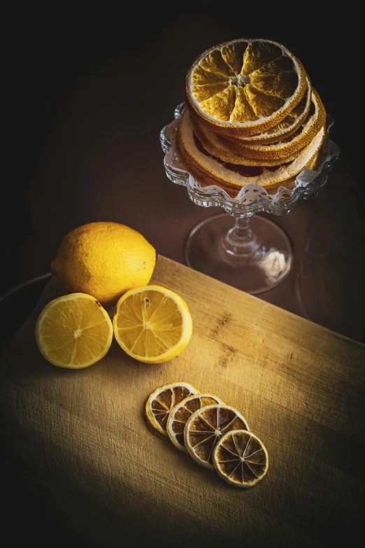 a wooden cutting board topped with sliced lemons, by Sven Erixson, renaissance, sweets, mead, crispy, multiple layers