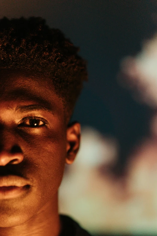 a close up of a person looking at the camera, by Carey Morris, black teenage boy, max verstappen, light from right, promo image