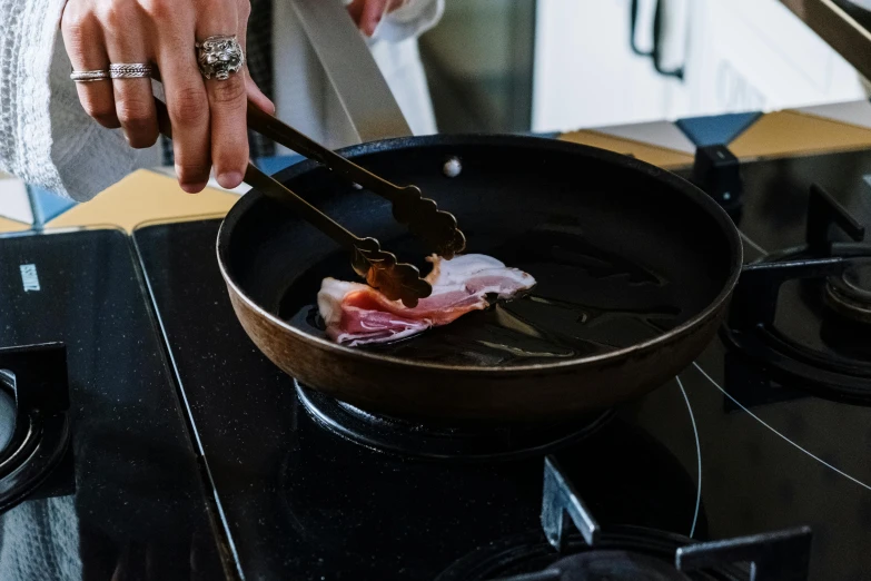 a person cooking food in a frying pan on a stove, ukiyo, fan favorite, the merge, rectangle