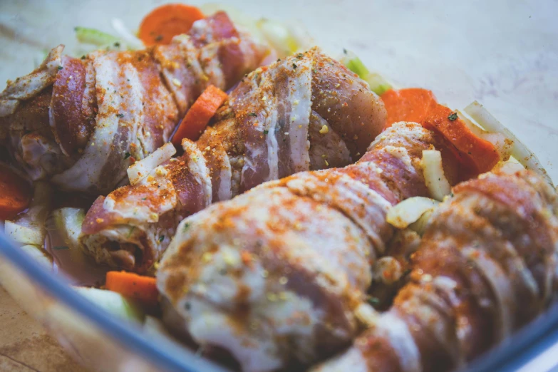 a glass bowl filled with meat and vegetables, pexels contest winner, renaissance, ribcage, local close up, stuffed, thumbnail