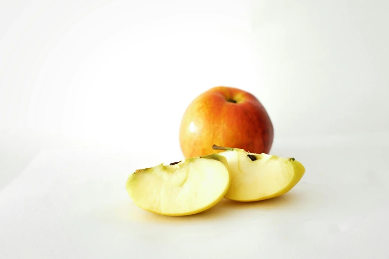 an apple with a bite taken out of it, a picture, unsplash, golden ration, light white background, background image, three quarter angle