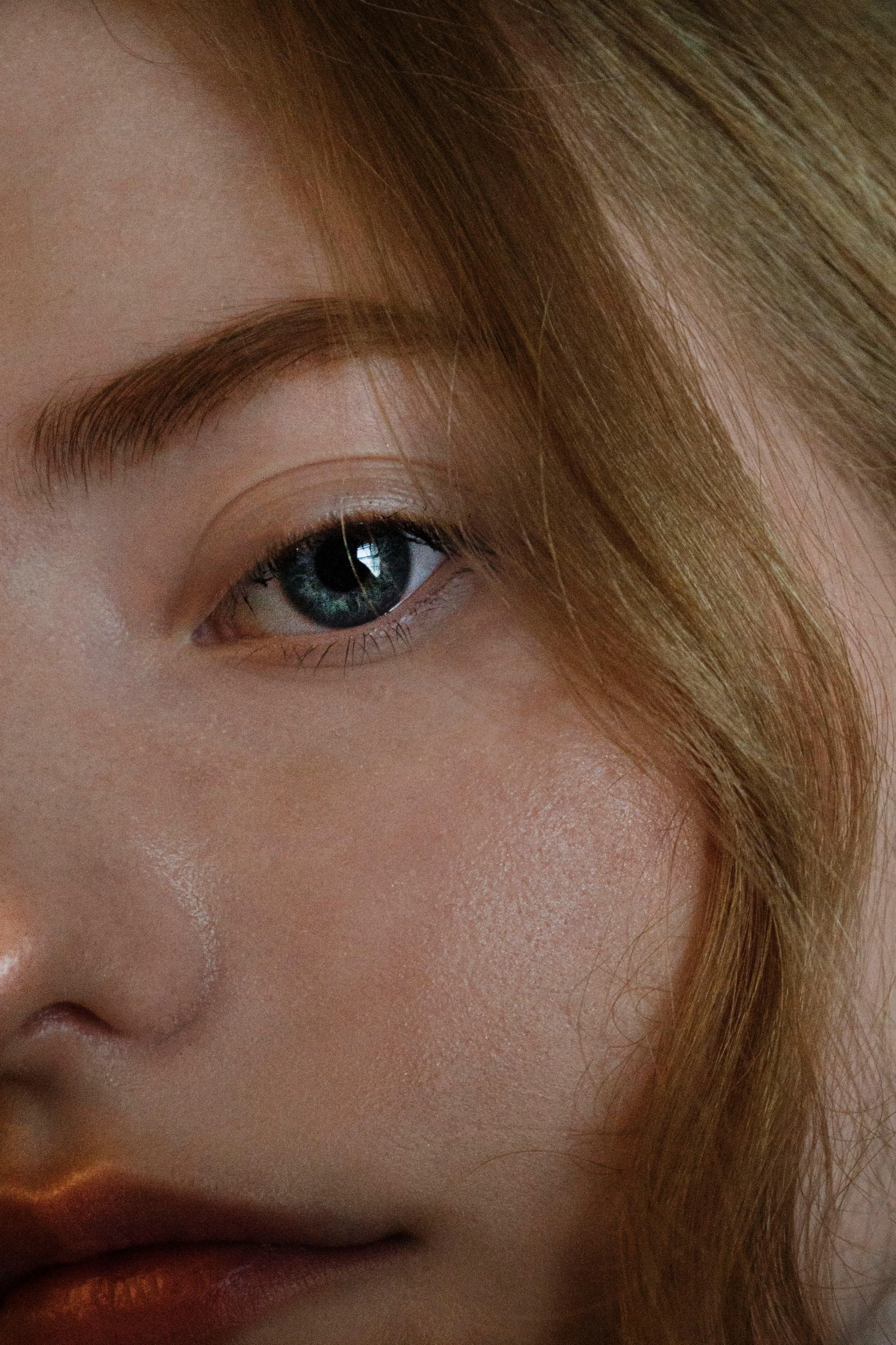 a close up of a woman with blue eyes, trending on pexels, hyperrealism, jimin\'s right eyelid swollen, light brown hair blue eyes, beautiful detailed body and face, blue symmetric eyes 24yo