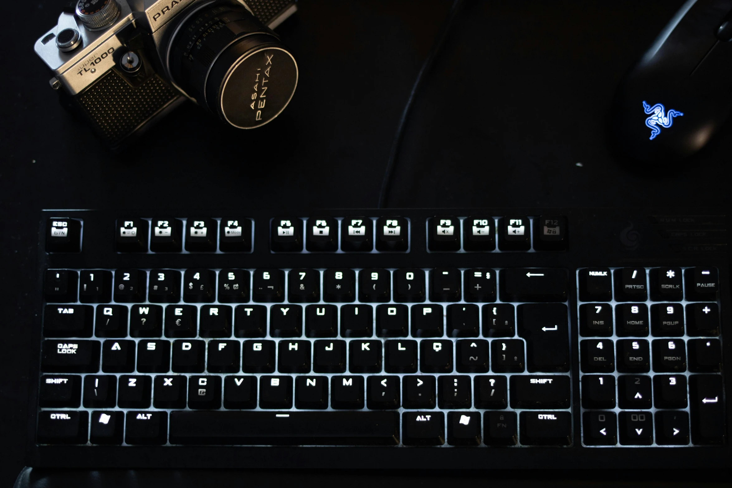 a computer keyboard with a camera next to it, reddit, hurufiyya, volumetric and perfect lighting, supersharp photo, game ready, high quality product image”