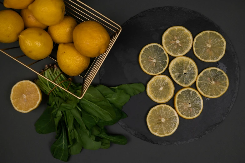 a bunch of lemons sitting on top of a table, detailed product image, greens), sleek round shapes, full product shot