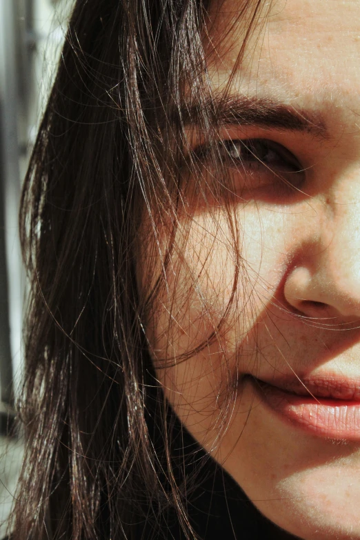 a close up of a person with long hair, by Robbie Trevino, pexels contest winner, round cheeks, sunlit, cindy avelino, 18 years old