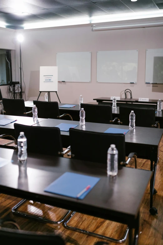 a room filled with lots of tables and chairs, meeting room, slate, instagram story, blue and black scheme