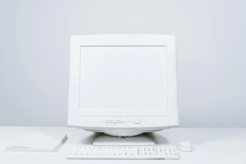 a white desktop computer sitting on top of a white desk, portrait shot, plain background, y2k design, getty images