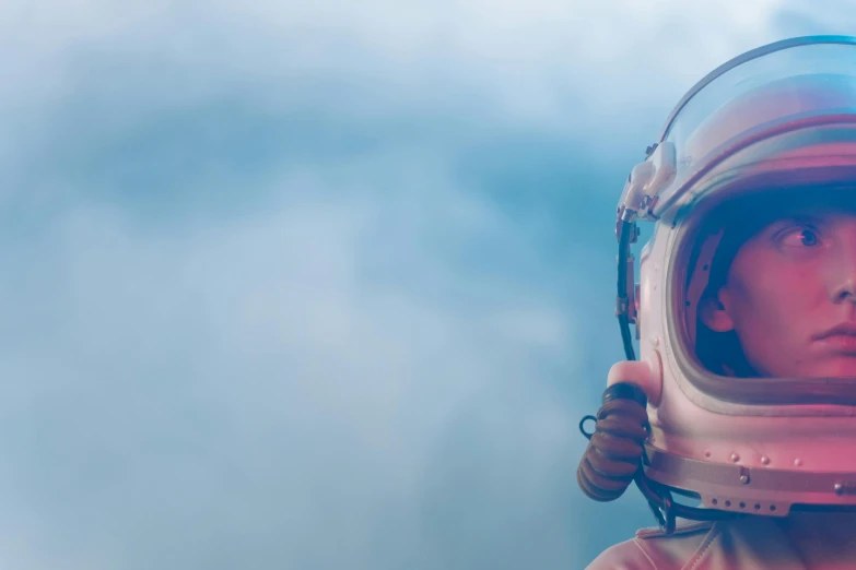 a close up of a person wearing a helmet, a picture, pexels contest winner, an astronaut lost in the ocean, the sky is pink, glass visor, avatar image