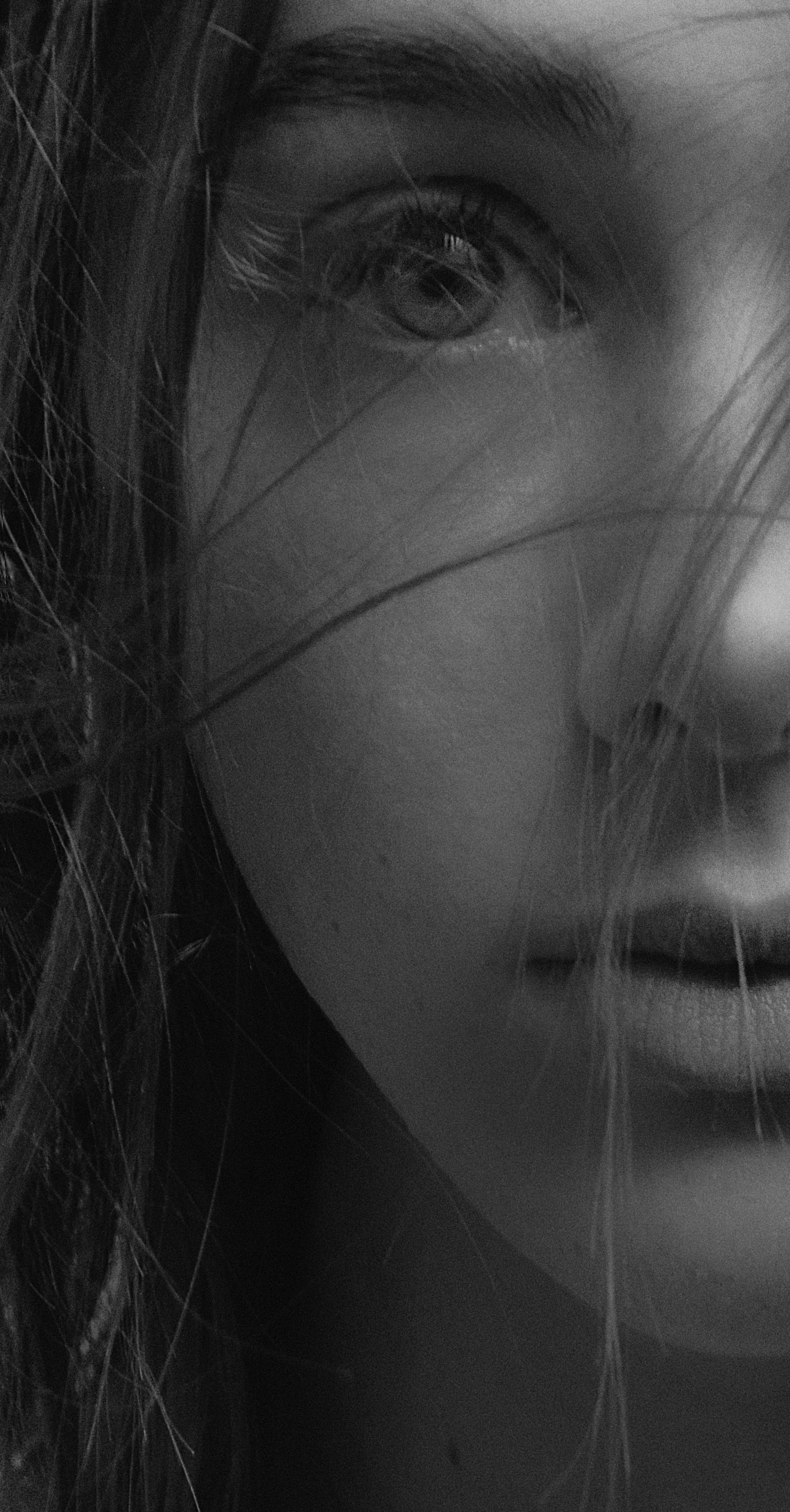 a black and white photo of a woman with long hair, by Steven Belledin, unsplash, photorealism, close up of face, noseless, depressed girl portrait, dynamic closeup