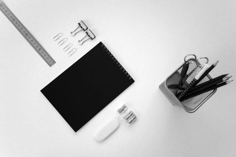 a black and white photo of office supplies on a desk, by Jan Kupecký, pexels contest winner, minimalism, white sketchbook style, miniature product photo, full body image, digital matte black paper art