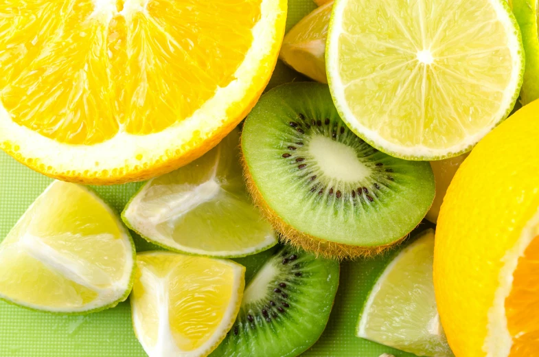 a pile of sliced oranges, limes, and kiwi, pexels, hurufiyya, on a yellow canva, thumbnail, test, blender