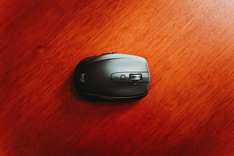 a computer mouse sitting on top of a wooden table, thumbnail, boka, the best, xf iq 4