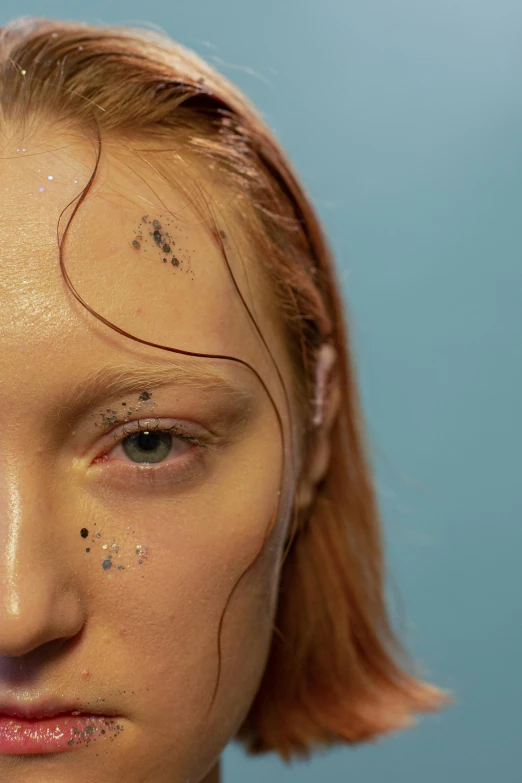 a close up of a woman with freckles on her face, an album cover, oily, promo image, kek, synthetic bio skin