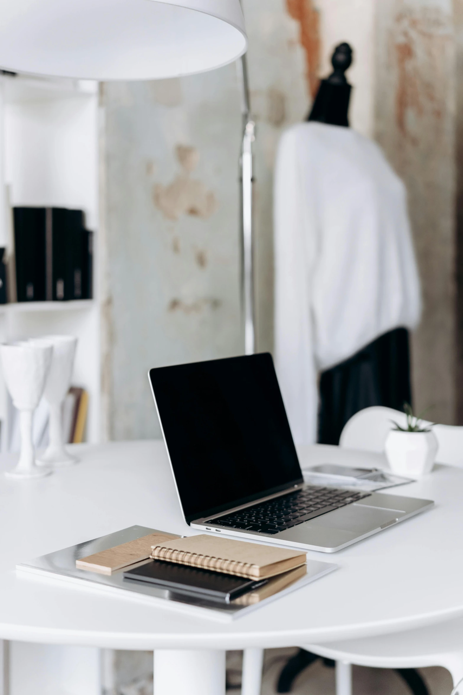 a laptop computer sitting on top of a white table, elegant clothing, clean and organized, detailed product image, aestheticly inspired