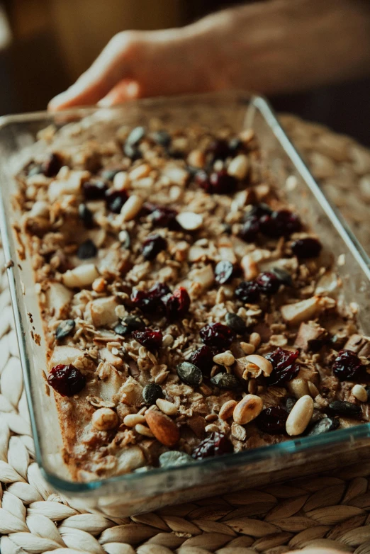 a close up of a person holding a tray of food, big oatmeal, botanicals, sheer, textured