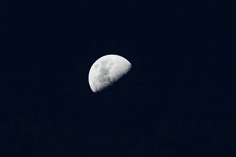 a half moon is seen in the dark sky, unsplash, minimalism, ☁🌪🌙👩🏾, instagram post, moon landing, ilustration