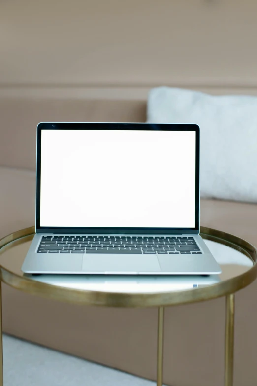 a laptop computer sitting on top of a glass table, by Carey Morris, pexels, 2 5 6 x 2 5 6 pixels, rounded lines, jen atkin, no - text no - logo