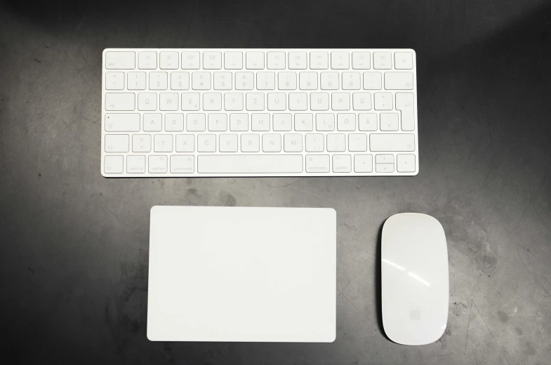 a keyboard, mouse and mouse pad on a table, by Carey Morris, minimalism, glossy white metal, no - text no - logo, square, kit