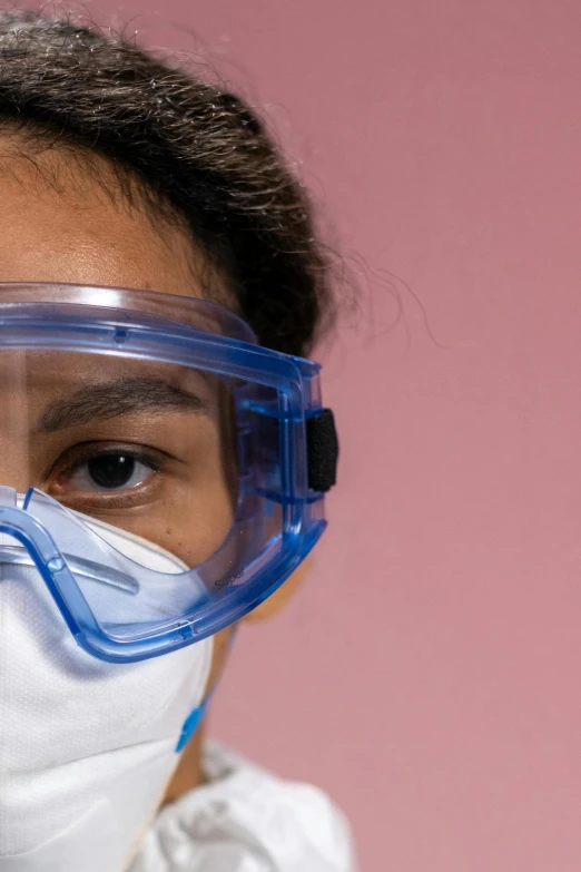 a close up of a person wearing a mask and goggles, plasticien, teenage girl, healthcare worker, essence, diverse