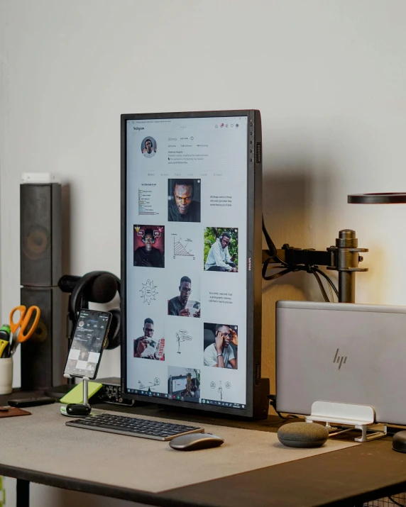 a desktop computer sitting on top of a wooden desk, inspired by Kōshirō Onchi, iron frame, lightbox, instagram picture, large tall