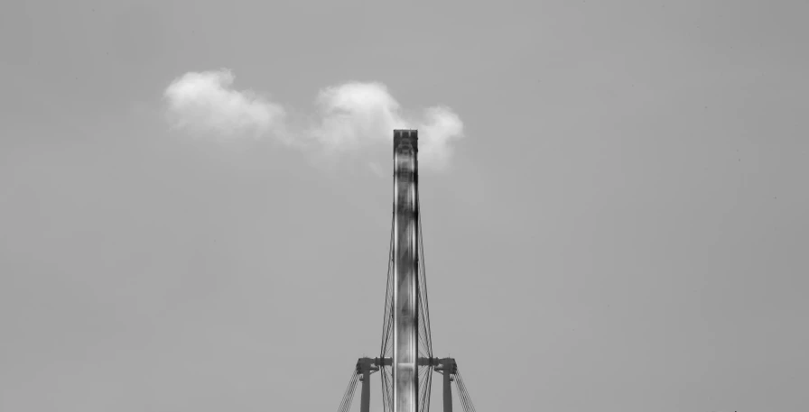 a black and white photo of smoke coming out of a chimney, a black and white photo, by Jan Rustem, pexels contest winner, postminimalism, roller coaster, mechanical structure, cloud with eye, steel and metal