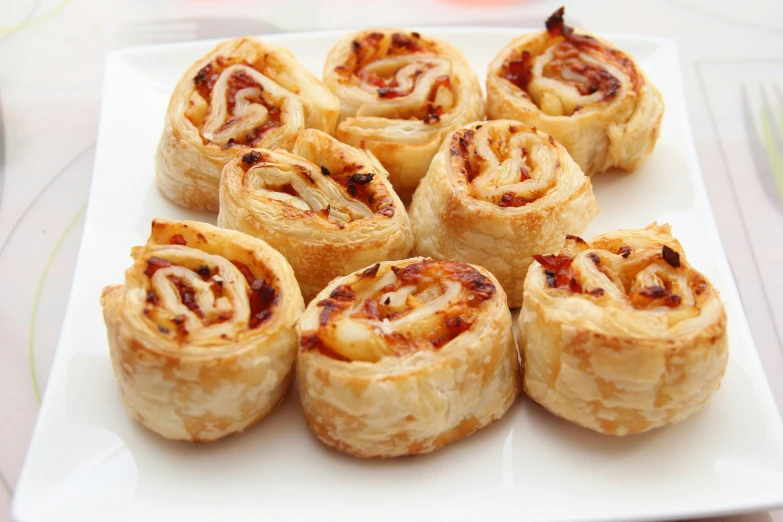 a close up of a plate of food on a table, pie eyes, 6 pack, twirls, listing image