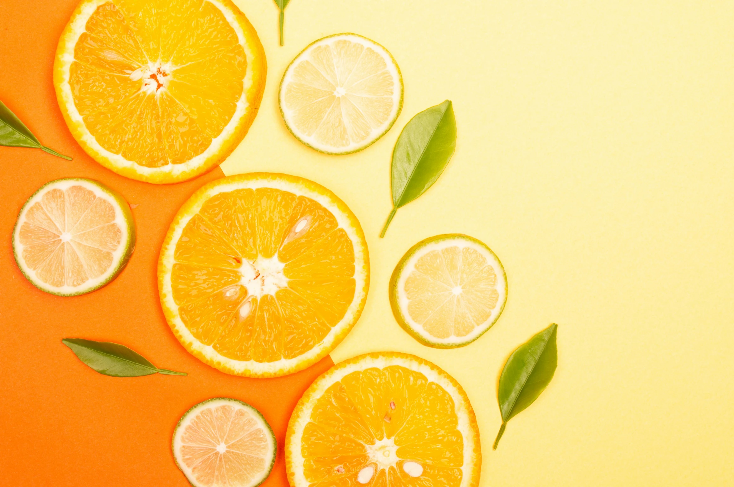 sliced oranges and lemons with leaves on an orange background, by Carey Morris, trending on pexels, 🐿🍸🍋, 🍸🍋, background image, skincare