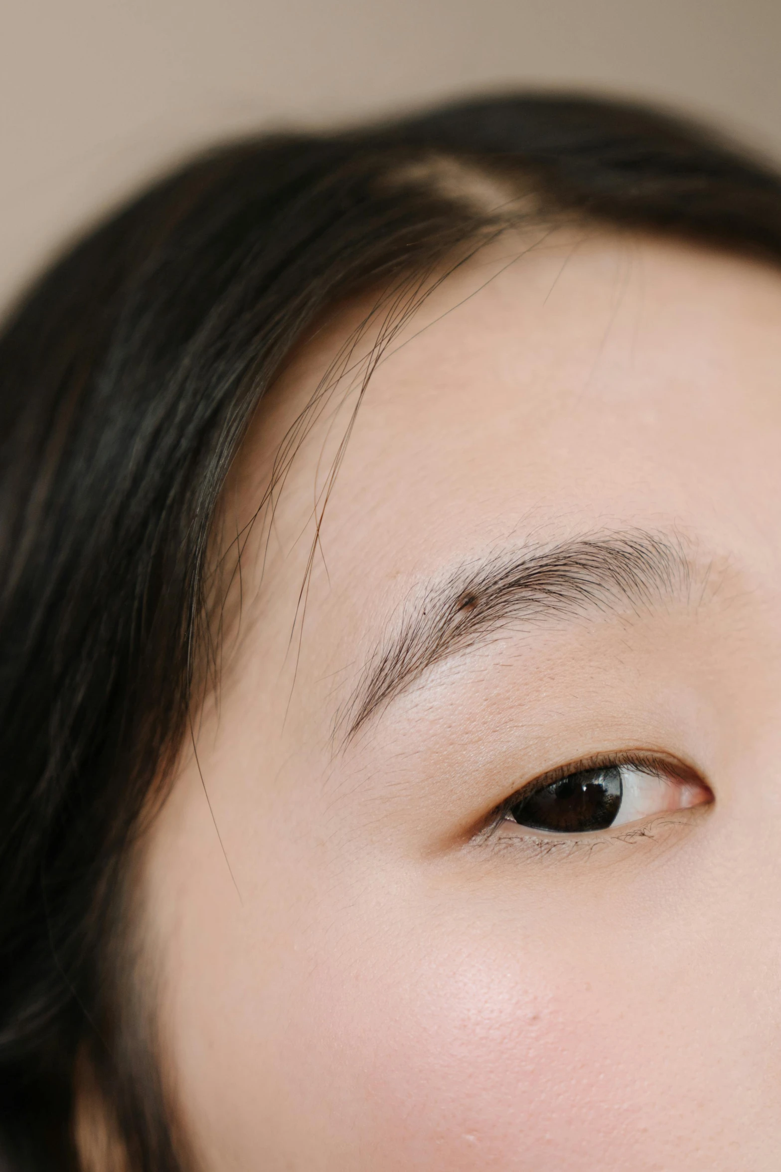 a close up of a woman brushing her teeth, an album cover, by helen huang, trending on pexels, hyperrealism, large eyebrows, jimin\'s right eyelid swollen, high angle closeup portrait, eyebrow scar