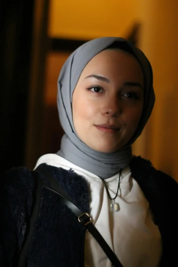 a woman in a hijab poses for a picture, dilraba dilmurat, ( ( theatrical ) ), taken in the late 2010s, promo image