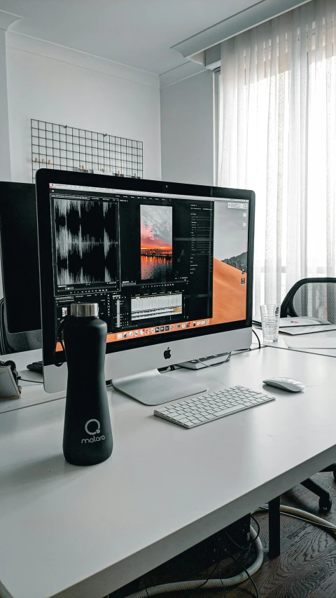a desktop computer sitting on top of a white desk, by Robbie Trevino, unsplash contest winner, audio waveform, dslr photo of a vase on a table, behance lemanoosh, luxury equipment