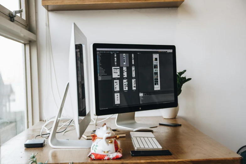 a computer monitor sitting on top of a wooden desk, trending on pexels, ornate designs on desk, gif, product design, pc screen image