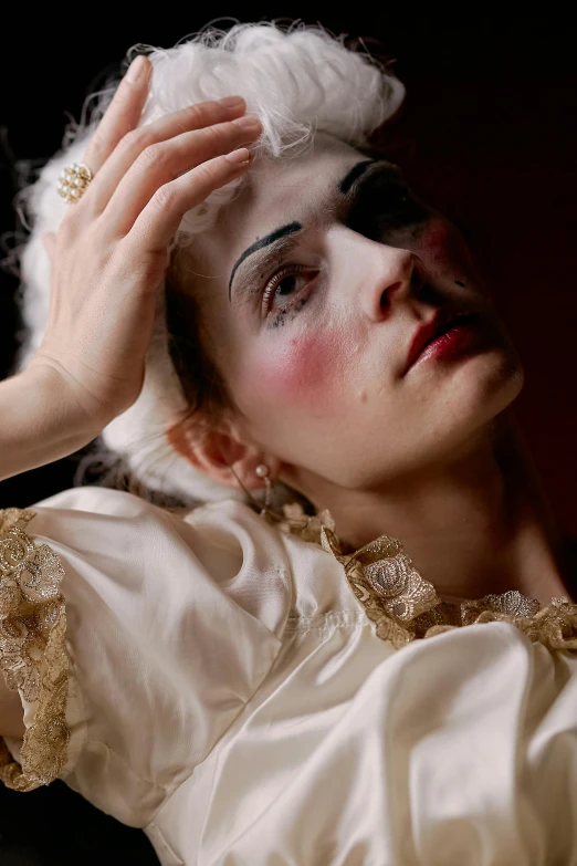 a close up of a person wearing a costume, a portrait, inspired by Anna Füssli, distraught, ballet, ( ( theatrical ) ), sleepy