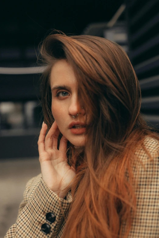 a woman with long red hair talking on a cell phone, inspired by Elsa Bleda, trending on pexels, renaissance, center parted brown hair, long windy hair style, woman's face, hair : long brown