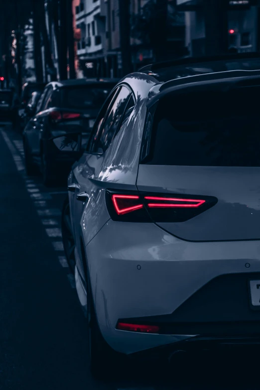 a white car parked on the side of a street, by Adam Marczyński, pexels contest winner, hypermodernism, tail lights, black neon lights, horns with indicator lights, avatar image