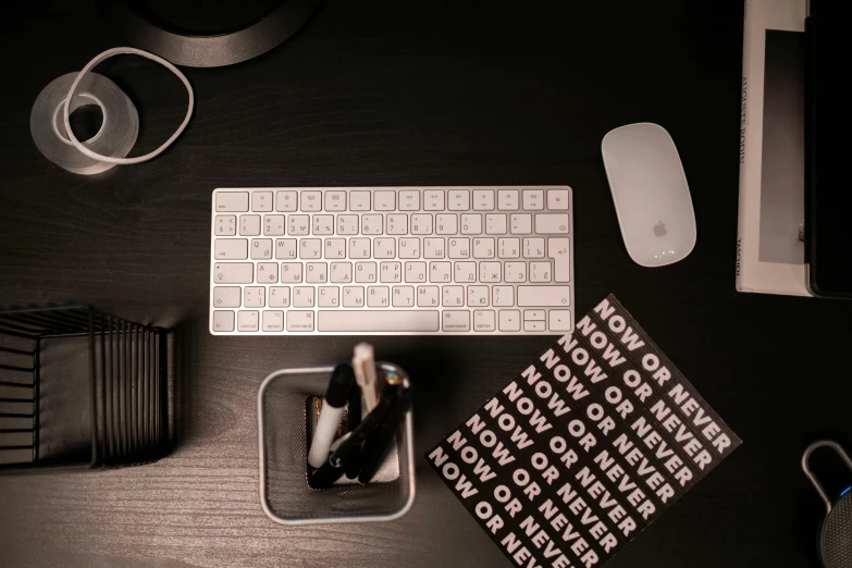 a computer keyboard sitting on top of a wooden desk, by Carey Morris, unsplash contest winner, lit. 'the cube', white mouse technomage, (night), modern minimalist f 2 0