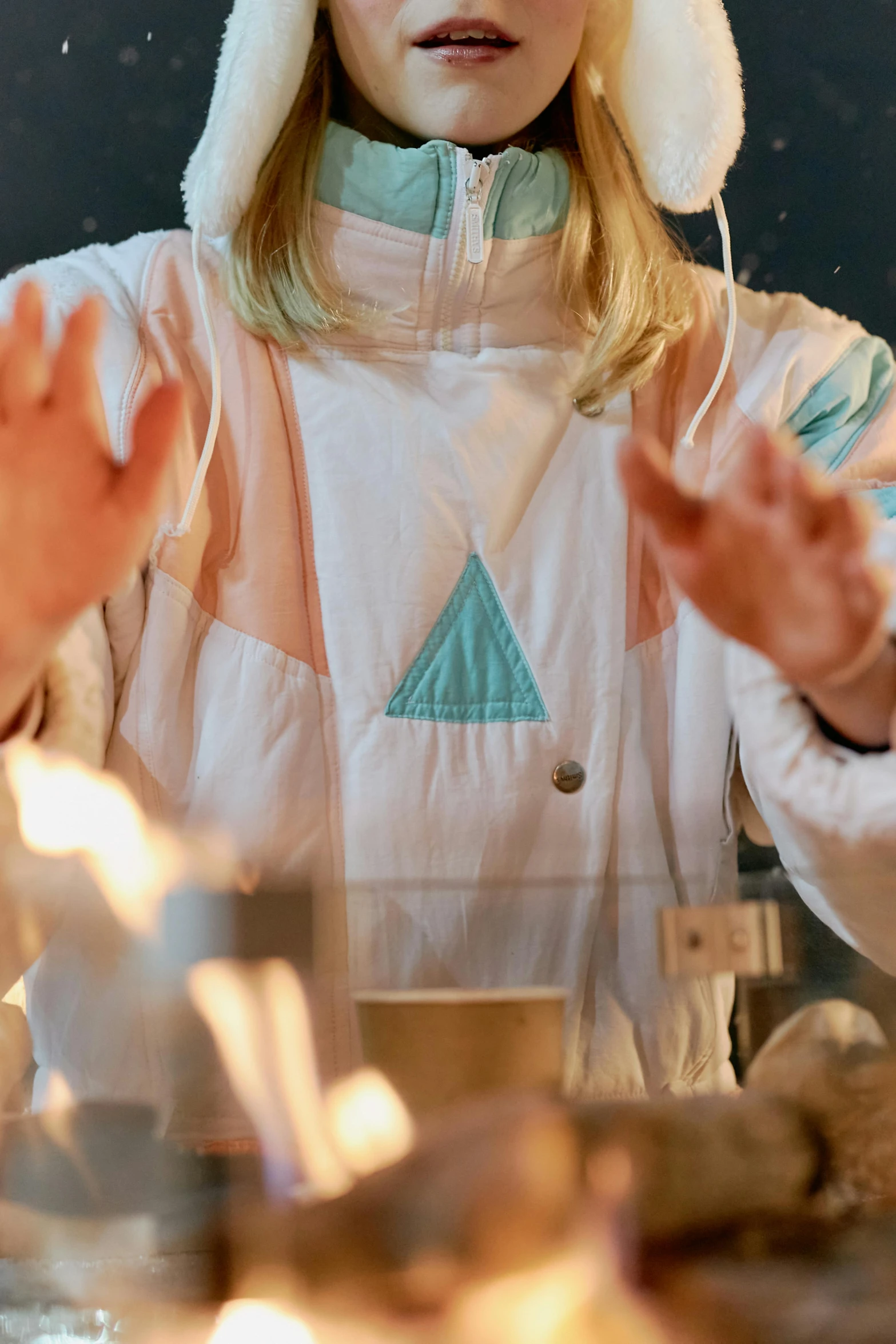 a woman sitting at a table with food in front of her, an album cover, by Julia Pishtar, unsplash, process art, staff wearing hazmat suits, dancing around a fire, white and teal garment, pyramid