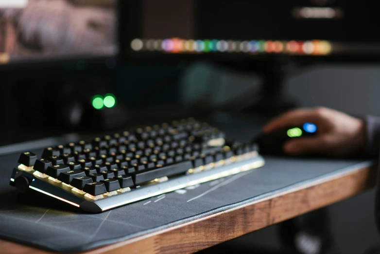 a computer keyboard sitting on top of a wooden desk, gaming table, looking across the shoulder, carefully crafted, threyda