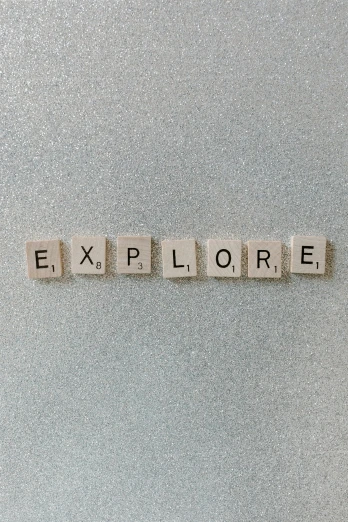 the word explore spelled in scrabbles on a refrigerator, an album cover, inspired by Vija Celmins, trending on unsplash, delicate ex embellishments, panel, magnetic, engineer