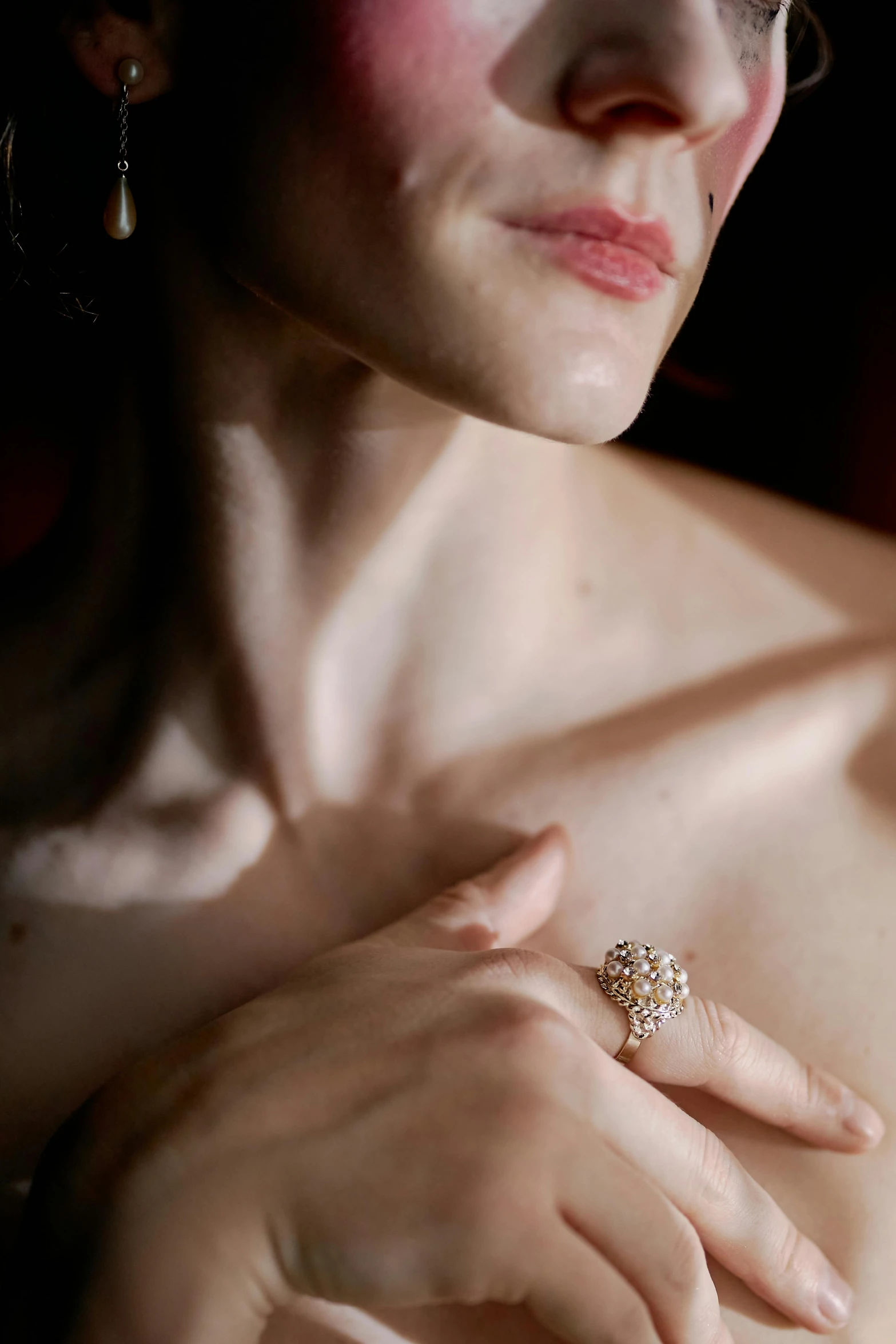 a close up of a woman with a ring on her chest, ivory pale skin, intricate lighting, slide show, item