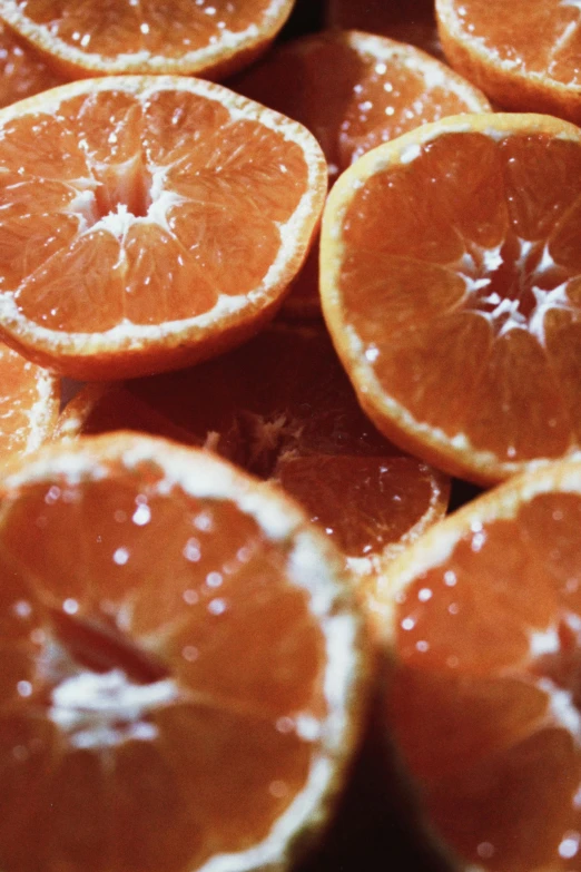 a pile of orange slices sitting on top of each other, award-winning crisp details”, grain”